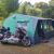 Honda Goldwing motorcycle near big camping tent